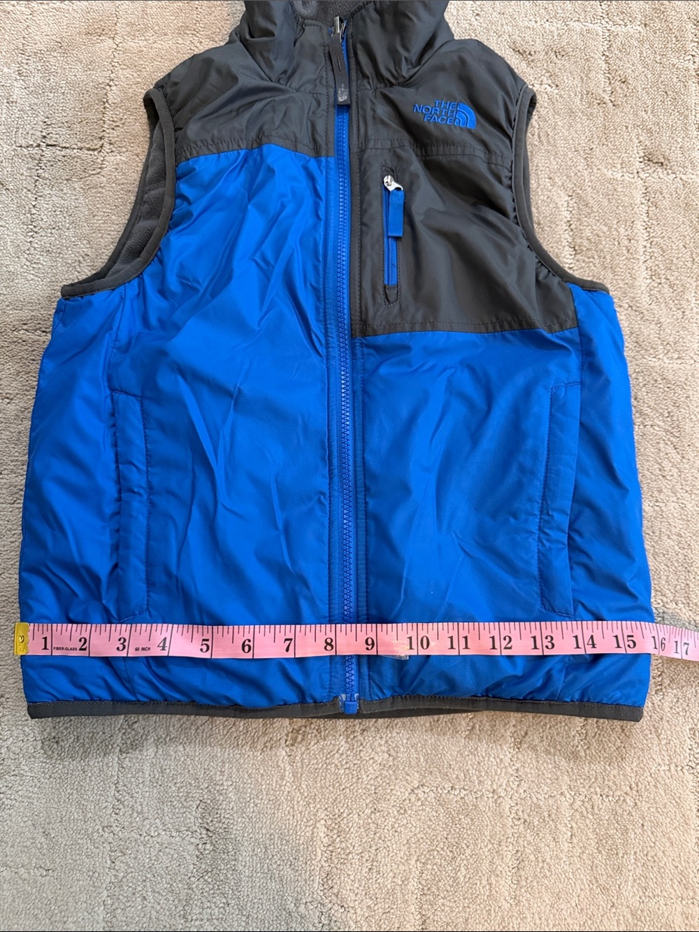 The North Face Boys Blue and Gray Puffer Vest reversible. - Picture 5 of 5